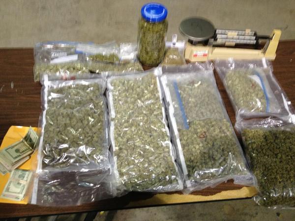 Bags of marijuana and cash confiscated during police search